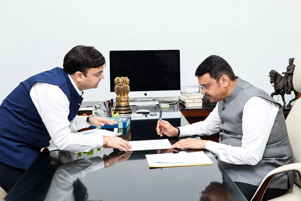 Business leaders and colleagues collaborating around a table in a modern office